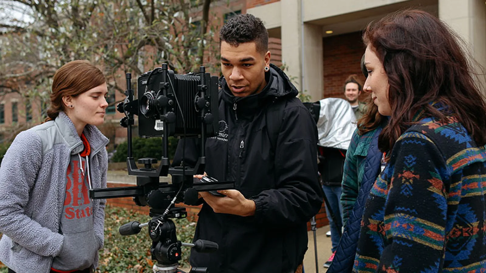 Students working with film camera