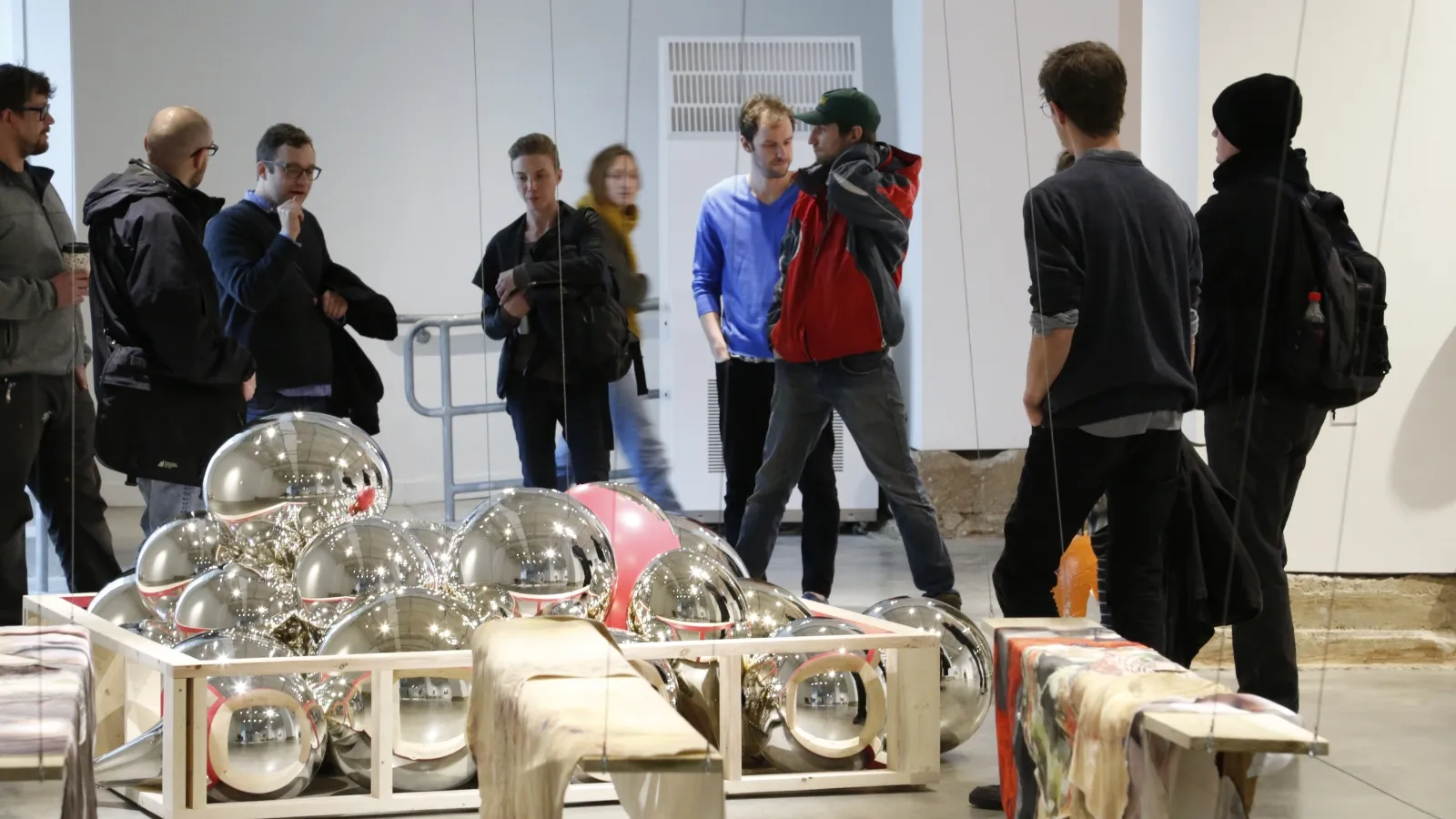 Visitors at the MFA Exhibition at the Urban Arts Space