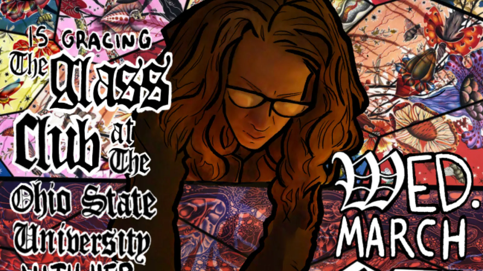woman with long hair and glasses bent over a stained glass surface working