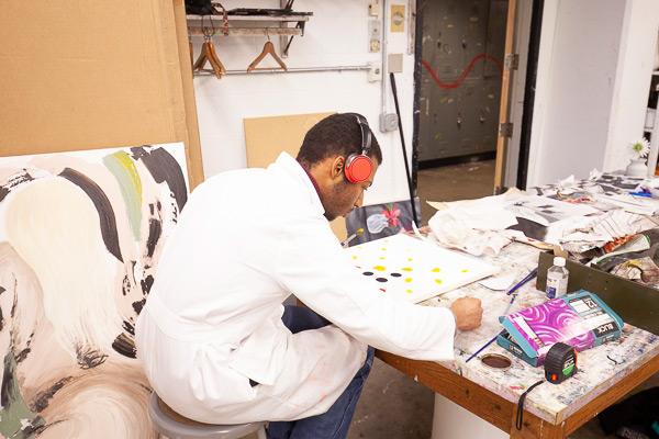 student painting in studio