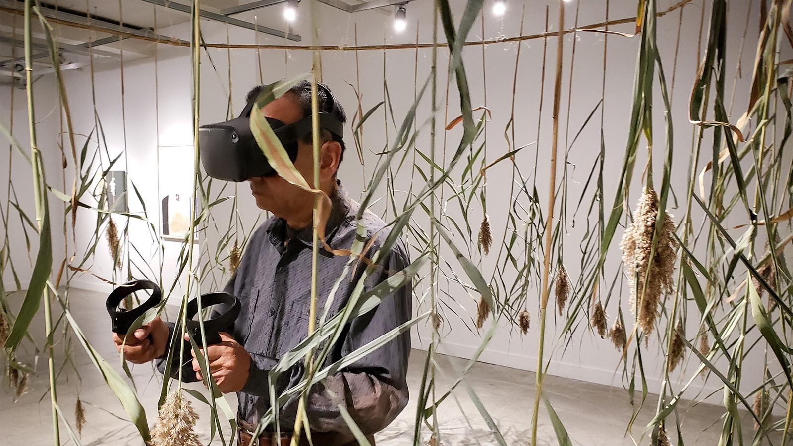 Installation with participant in virtual reality gear